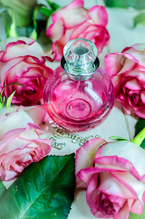 simsearch:700-06892568,k - a bottle of perfume among beautiful flowers Stock Photo - Budget Royalty-Free & Subscription, Code: 400-09221511