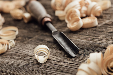 simsearch:400-05385082,k - Carpenter's old workbench: gouge and wood shavings close up, woodworking and DIY concept Stock Photo - Budget Royalty-Free & Subscription, Code: 400-09221577