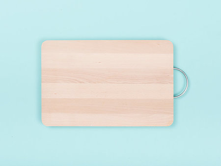 Clean wooden chopping board on light blue background, food preparation and kitchen equipment concept Stock Photo - Budget Royalty-Free & Subscription, Code: 400-09221612