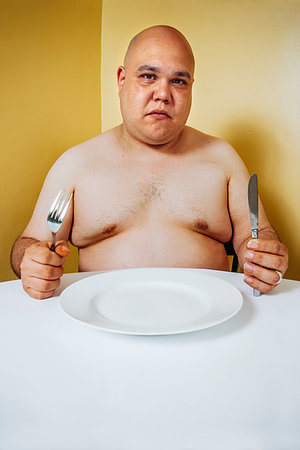 sad fat man - Photo of a large topless man waiting impatiently at a table for food. Stock Photo - Budget Royalty-Free & Subscription, Code: 400-09222880