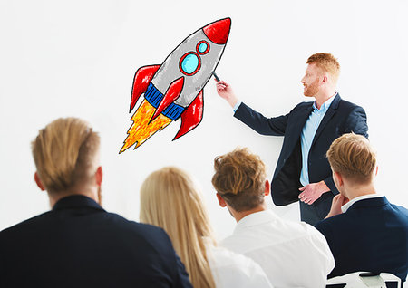 simsearch:400-09112433,k - Businessman drawing a fast rocket during a training meeting. Concept of business improvement and enterprise startup Stockbilder - Microstock & Abonnement, Bildnummer: 400-09223107