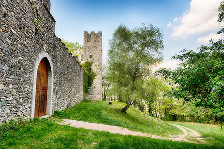 stone walls in meadows - ancient fortress of Orino in the woods of the regional park Campo dei Fiori Varese Stock Photo - Budget Royalty-Free & Subscription, Code: 400-09223585