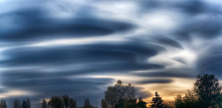 Incredible lenticular clouds in the sky during a sunset in the autumn season Stock Photo - Budget Royalty-Free & Subscription, Code: 400-09223661