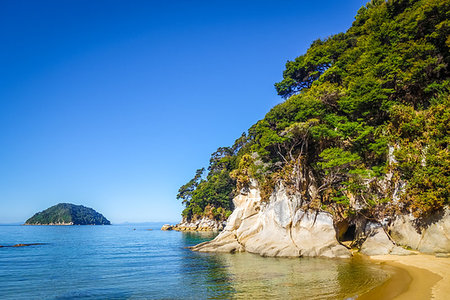 Abel Tasman National Park. White sand bay and turquoise sea. New Zealand Stock Photo - Budget Royalty-Free & Subscription, Code: 400-09223818