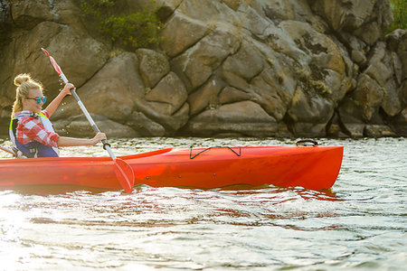 simsearch:400-05362222,k - Young Woman Paddling Kayak on the Beautiful River or Lake among Stones at the Evening Stock Photo - Budget Royalty-Free & Subscription, Code: 400-09237564