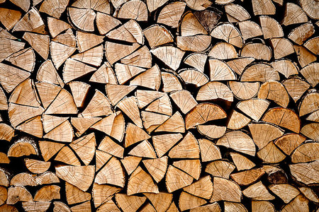 Chopped logs for winter fire. Pile of chopped fire wood prepared for winter. Chopped firewood texture background Stock Photo - Budget Royalty-Free & Subscription, Code: 400-09237824