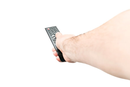 simsearch:400-05223721,k - Male hand holding a remote control, pressing a button, isolated on white background, first-person view Foto de stock - Royalty-Free Super Valor e Assinatura, Número: 400-09238196