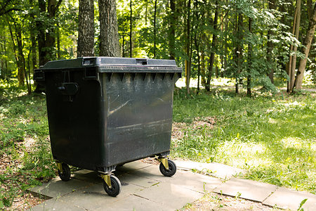 Garbage container in the park in summer time Stock Photo - Budget Royalty-Free & Subscription, Code: 400-09274089