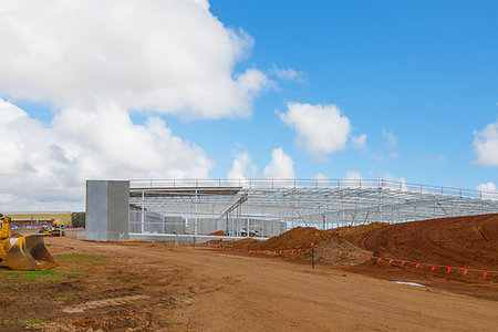 earthwork - construction site of modern shopping centre against blue sky Stock Photo - Budget Royalty-Free & Subscription, Code: 400-09274104