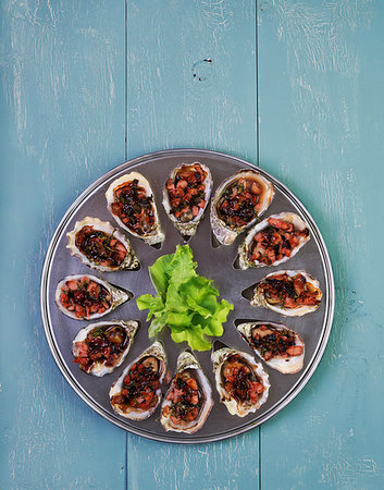 simsearch:400-04406446,k - Oven baked oysters kilpatrick on special cooking and serving metal tray Stock Photo - Budget Royalty-Free & Subscription, Code: 400-09274101