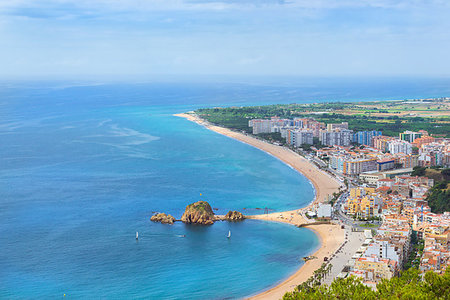 simsearch:851-02963102,k - Coast, rock Sa Palomera and architecture of Spanish beach resort Blanes in summertime. Sunny panorama from height of mountain of castle San Juan. Costa Brava, Catalonia, Spain Stock Photo - Budget Royalty-Free & Subscription, Code: 400-09274328