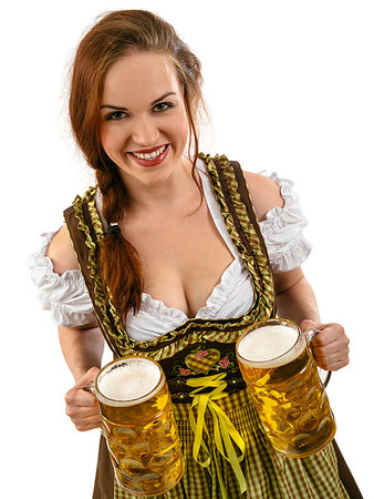 simsearch:400-07294051,k - Photo of a beautiful female waitress wearing traditional dirndl and holding huge beers over white background. Stock Photo - Budget Royalty-Free & Subscription, Code: 400-09274644
