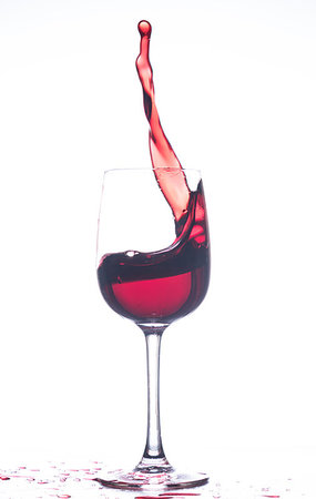 simsearch:400-04264239,k - Swirl wine in the wineglass. Poured wine Stock Photo - Budget Royalty-Free & Subscription, Code: 400-09275380