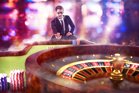 simsearch:400-07832442,k - 3D Rendering of man gambler playing roulette Stock Photo - Budget Royalty-Free & Subscription, Code: 400-09273287