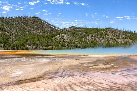 simsearch:400-05015574,k - Grand Prismatic Spring as they  walking along path in Midway Geyser Basin, Yellowstone National Park, Wyoming Stock Photo - Budget Royalty-Free & Subscription, Code: 400-09273792