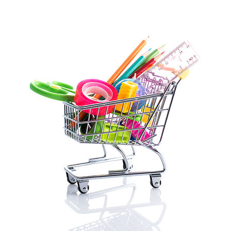 simsearch:400-05886915,k - Stationery and back to school items in a miniature shopping cart on white background Stock Photo - Budget Royalty-Free & Subscription, Code: 400-09273815