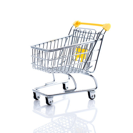 simsearch:400-04318606,k - Miniature shopping cart on white background: supermarket grocery shopping and retail concept Foto de stock - Super Valor sin royalties y Suscripción, Código: 400-09273813