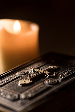 prayer candle and cross - Precious old Bible and lit candles in the Church: Christianity and faith concept Stock Photo - Budget Royalty-Free & Subscription, Code: 400-09273833