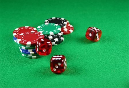 Action shot of 5 dice thrown onto a table - fast shutter showing dice in the air Stock Photo - Budget Royalty-Free & Subscription, Code: 400-03908273