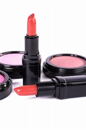 simsearch:693-07912160,k - Detail of assortment of makeup.  Macro shot on white background. Shallow depth of field Foto de stock - Super Valor sin royalties y Suscripción, Código: 400-03908497