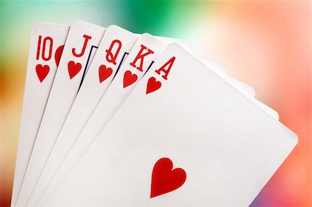 simsearch:625-01749129,k - Royal flush with brightly-coloured background Stockbilder - Microstock & Abonnement, Bildnummer: 400-03908691