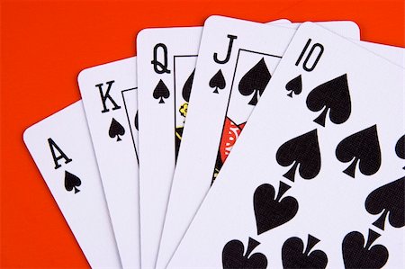 simsearch:400-04382425,k - Royal flush in spades with red background. Stock Photo - Budget Royalty-Free & Subscription, Code: 400-03908836