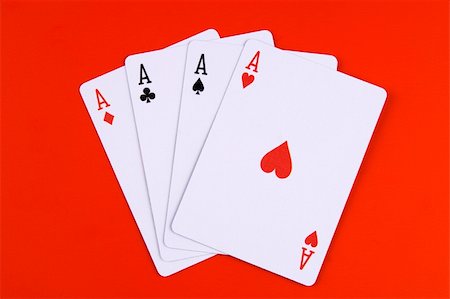 pik - Cards of four aces in red background. Stockbilder - Microstock & Abonnement, Bildnummer: 400-03908830