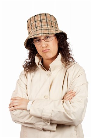Upset business woman with raincoat over a white background Stock Photo - Budget Royalty-Free & Subscription, Code: 400-03908957