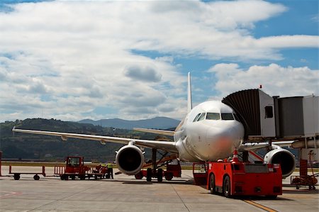 energy power truck - Maintenance and load of luggage in the airplane Stock Photo - Budget Royalty-Free & Subscription, Code: 400-03909056