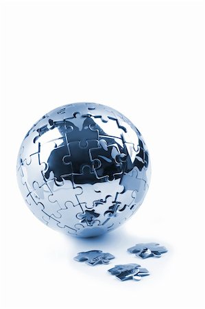simsearch:400-04776028,k - Metaphor image with globe and falling peaces against white background Photographie de stock - Aubaine LD & Abonnement, Code: 400-03909105