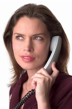 simsearch:400-04291703,k - Pretty brunette secretary  with telephone headset Stock Photo - Budget Royalty-Free & Subscription, Code: 400-03909135