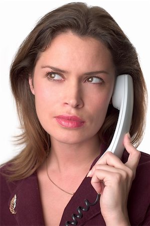 simsearch:400-03914864,k - Pretty brunette secretary  with telephone headset Stock Photo - Budget Royalty-Free & Subscription, Code: 400-03909136