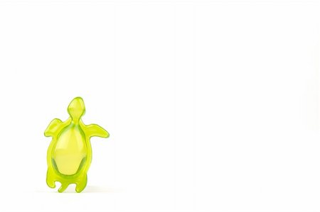 simsearch:400-03950235,k - bath soap in the shape of a green tortoise, isolated on white background Photographie de stock - Aubaine LD & Abonnement, Code: 400-03909158