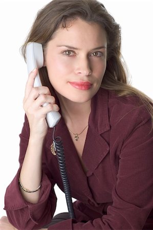 simsearch:400-03914864,k - Pretty brunette secretary with telephone headset Stock Photo - Budget Royalty-Free & Subscription, Code: 400-03909481