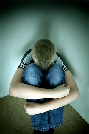 upset boy against a wall Stock Photo - Budget Royalty-Free & Subscription, Code: 400-03914232