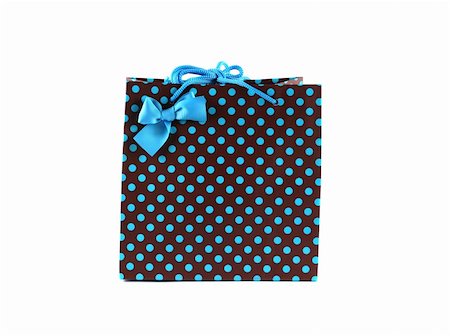 decorations in shopping mall - Brown and blue spotted gift bag isolated on white. Stock Photo - Budget Royalty-Free & Subscription, Code: 400-03914874