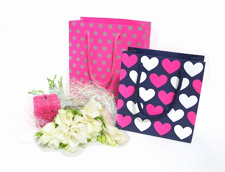 Gift bags and flowers for someone's birthday or other special occasion Stock Photo - Budget Royalty-Free & Subscription, Code: 400-03914880