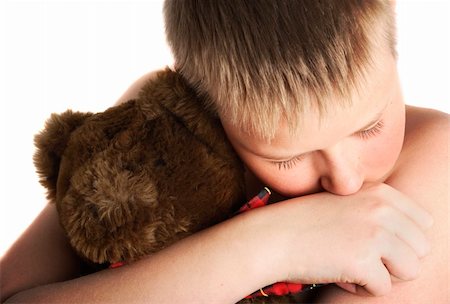 Sad big boy with his old friend teddy Stockbilder - Microstock & Abonnement, Bildnummer: 400-03914945