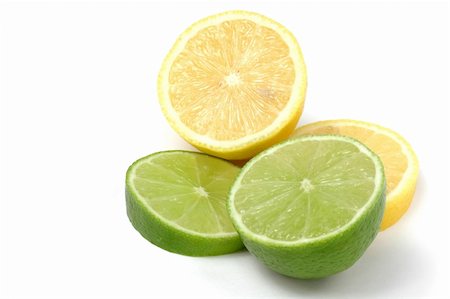 squeezing (make juice) - Lemon Lime Isolated on White Stock Photo - Budget Royalty-Free & Subscription, Code: 400-03915137