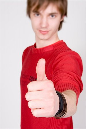 simsearch:400-03952911,k - young man with thumbs up Stock Photo - Budget Royalty-Free & Subscription, Code: 400-03915167