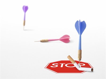 stop sign with a cigarette and a 3 darts on a white background Stock Photo - Budget Royalty-Free & Subscription, Code: 400-03915162