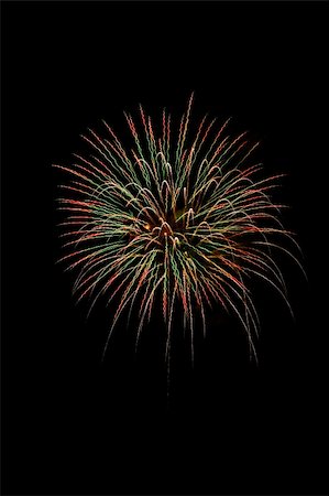 simsearch:400-07093371,k - Multiple fireworks burst on a dark night sky Fotografie stock - Microstock e Abbonamento, Codice: 400-03915264
