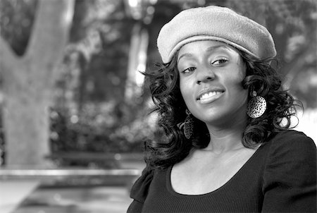 Portrait of Flirty African-American in the park Photographie de stock - Aubaine LD & Abonnement, Code: 400-03915306