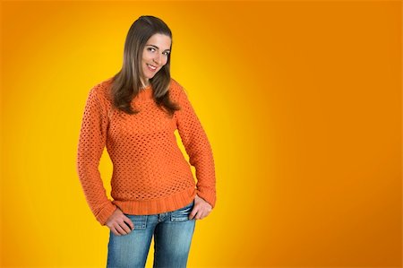 simsearch:400-04635813,k - Beautiful woman with a frendly face on a orange background Stock Photo - Budget Royalty-Free & Subscription, Code: 400-03915487