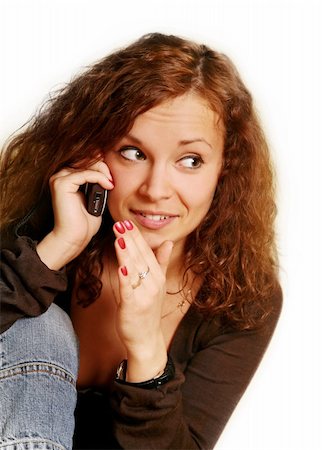 Pretty smiling brunette with the phone Stockbilder - Microstock & Abonnement, Bildnummer: 400-03916187