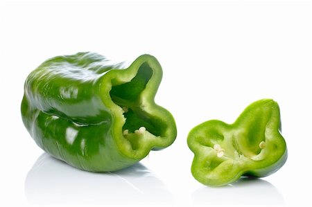 simsearch:400-05065763,k - A fresh and tasty green pepper slices reflected on white background. Shallow DOF Stockbilder - Microstock & Abonnement, Bildnummer: 400-03916554