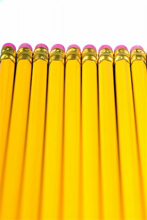 simsearch:670-06451367,k - a row of yellow pencils with eraser, isolated over white Photographie de stock - Aubaine LD & Abonnement, Code: 400-03916666