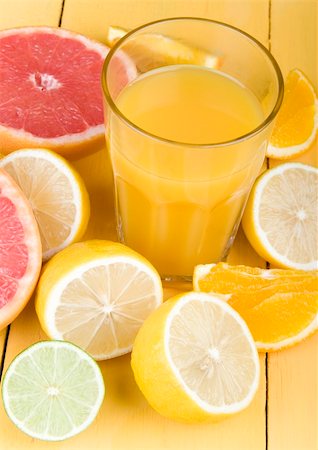 squeezing lemon juice - Watch fruits. Eat fruits. Buy fruits! Stock Photo - Budget Royalty-Free & Subscription, Code: 400-03916835