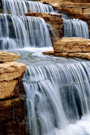 simsearch:400-05059020,k - Beautiful cascading waterfall over natural rocks, landscaping element Stock Photo - Budget Royalty-Free & Subscription, Code: 400-03916904