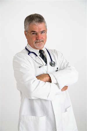 pblscooter (artist) - Doctor wearing a white lab coat with arm crossed with a disbelieving expression Stock Photo - Budget Royalty-Free & Subscription, Code: 400-03916966